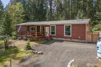 The back of the home has a large free-standing deck.