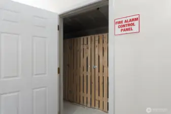 Main level secure storage locker for each unit