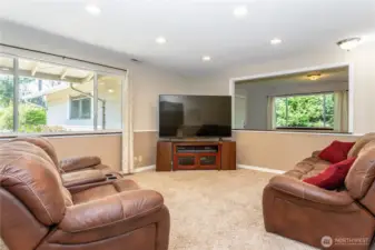 The living room is spacious and accommodates large-scale furniture