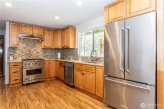 Lots of upper & lower cabinetry, ideal for people who like to cook.