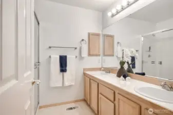 The primary bath featuring a double vanity