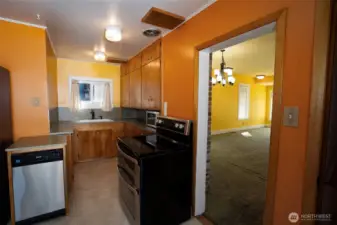 Efficient kitchen space with large breakfast nook filled with light!