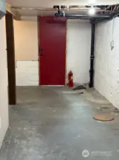 Basement with separate entrance and loads of storage.