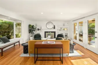 Light pours in from the wall of glass in the living room.