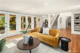 From the living room, you can view the circular floor plan - dining room and kitchen to the left, bedrooms and bath to the right.