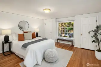 The second bedroom on the main floor was the original primary bedroom with 2 closets.