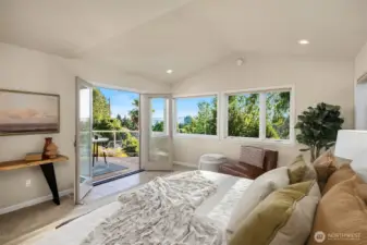 French doors from the primary suite open to the view deck.