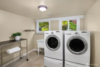 The utility room on the lower level was originally a bedroom and could be converted back if desired.