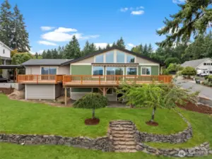 Windows and a wraparound entertainer's deck catch every angle of the view