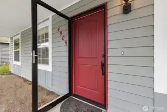 Covered front porch and new front door.