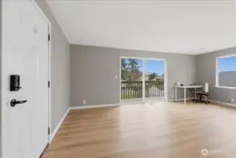 Front door, sliding door to balcony