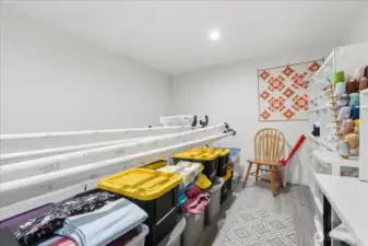 Storage room is currently a quilting room with a longarm machine