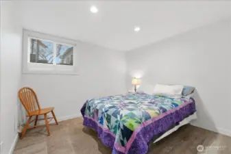 Lower level bedroom (queen sized bed) with ample room and lots of natural light