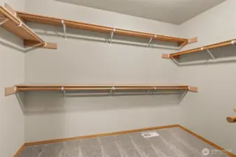 Oversized walk-in closet in priamary