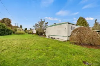 Common area off your back porch is directly behind the home!