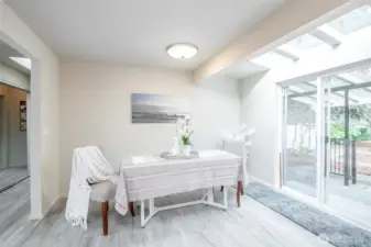Dining room that looks out to your covered patio and open space park.