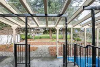 Covered patio to low maintenance backyard.