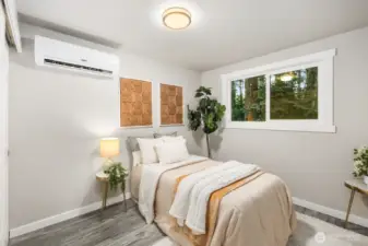 Upstairs bedroom(2) with mini-split and forest view. You'll no longer need to fall asleep hot(or cold)...just comfortable.