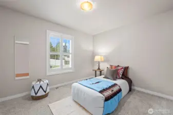 This is first bedroom from entry door from garage.