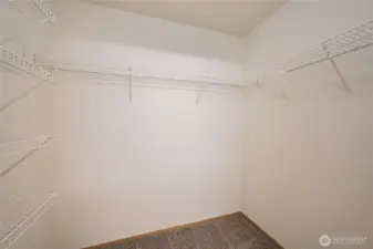 Primary walk in closet.