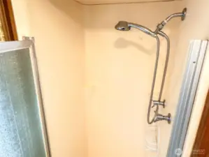 Shower with detachable shower wand.