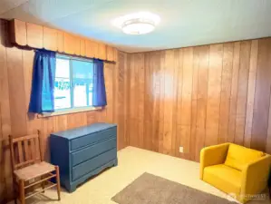 Second bedroom with a double window.