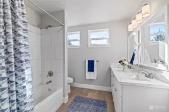 Each bathroom in this home is designed with style and convenience, showcasing premium materials and thoughtful design.