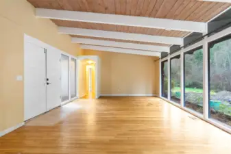 Living room looking toward hall to bedrooms (note the Spanish arch)