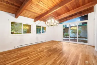 HUGE dining room with a fabulous chandelier - with a wet bar in the corner (not shown)