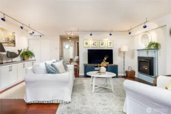 Living room with plenty of cabinets for storage.