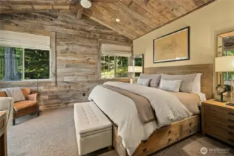 A stylish retreat with rustic warmth, the primary suite exudes comfort and elegance.
