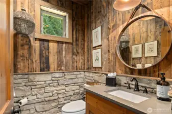With unique design touches, the main-floor half bath itself is a true showstopper.