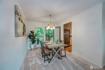 Formal Dining Area w/Slider To Private Deck Area.