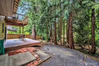 Another View Of Back Of The House Showing Both Decks And Private Park Like Yard.