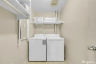 Spacious utility room with a full-size washer/dryer—laundry made easy!