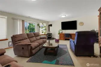 Extra Large Family Room That Leads Outside.