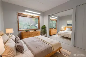 Virtually staged for inspiration.  Super sunny bedroom #3. Extra storage space.  A bit of paint and new carpet/flooring would completed this space.