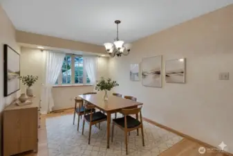 This generous dining room will hold a large table and chairs, ready to host several dinner guests.