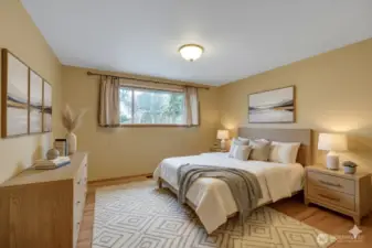 One of three bedrooms all with hardwood floors.