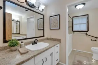 Good size full bath with large vanity.