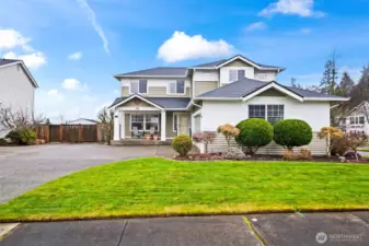 The wide driveway makes it easy to get in and out of the garage and offers additional parking.
