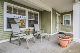 A covered front patio provides plenty of room to relax.