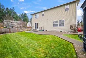 This right here-sized yard has an extended patio, gazebo, and a good amount of grass.
