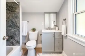 Updated bathroom and plumbing for peace of mind and lasting reliability. Photos from earlier listing in 2025.