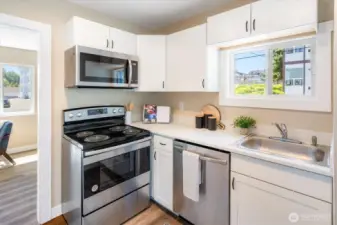 Detached Unit: Brand new stainless steel appliances, including an exterior-vented microwave for enhanced air quality. Photos from earlier listing in 2025.