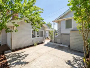Fully fenced cozy courtyard with fruit trees