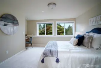 Lower level includes four spacious bedrooms with new paint, carpet, built-in desk and closets organizers. They are situated on either side of of the family/media/game room and hallway full bath; two on each side.