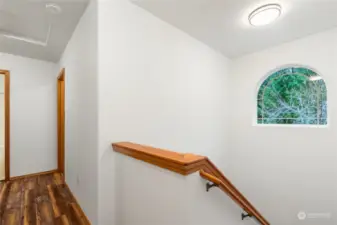 Upstairs hallway to all three bedrooms.