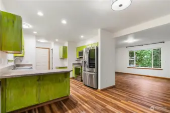 Fabulous bright kitchen with stainless steel appliances.