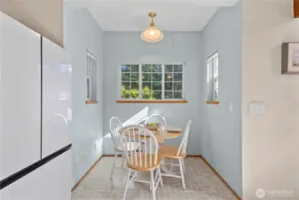 Darling kitchen with breakfast nook.